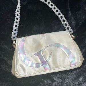 Authentic, re-worked Cristian Dior makeup bag.